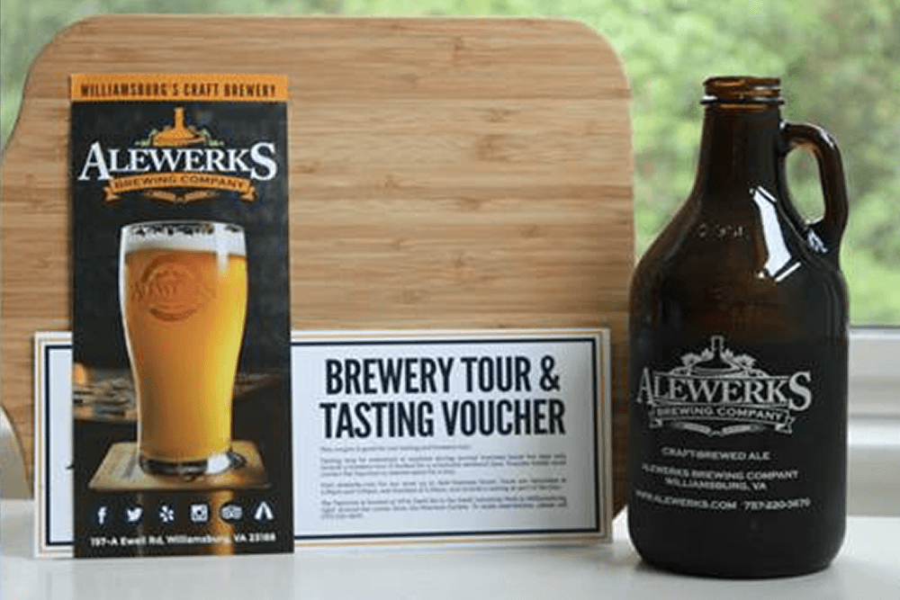 Beer in a glass in front of a sign for ale works and a brown growler