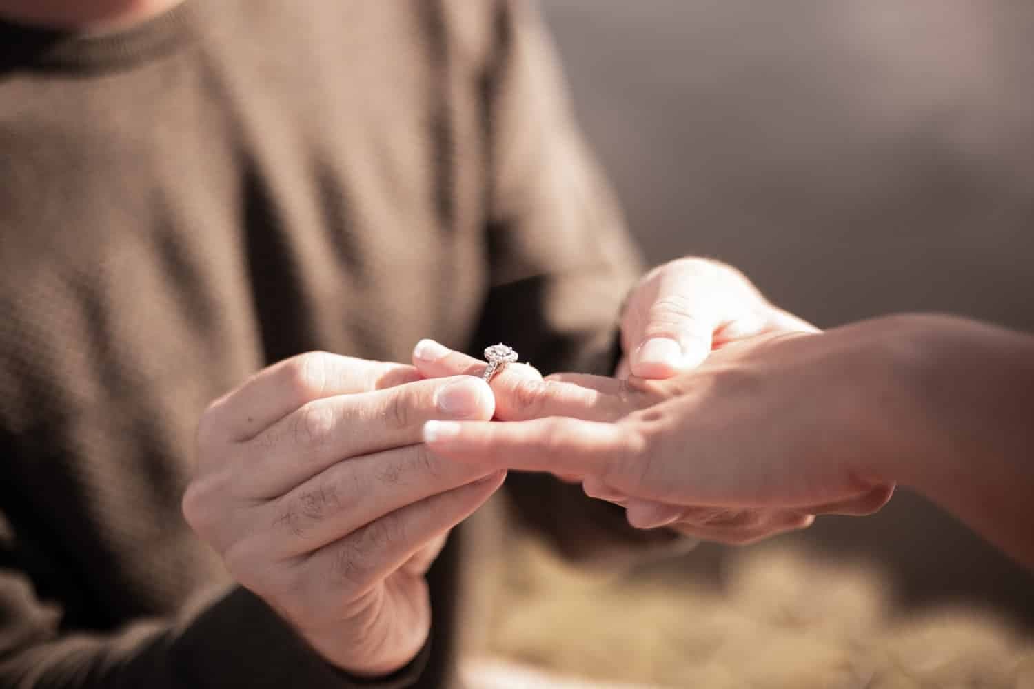 caucasian hands engagement ring